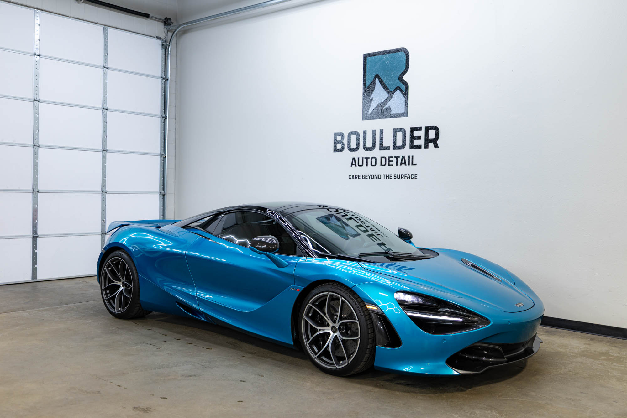 luxury sports car in auto detailing studio filmed for automotive video production