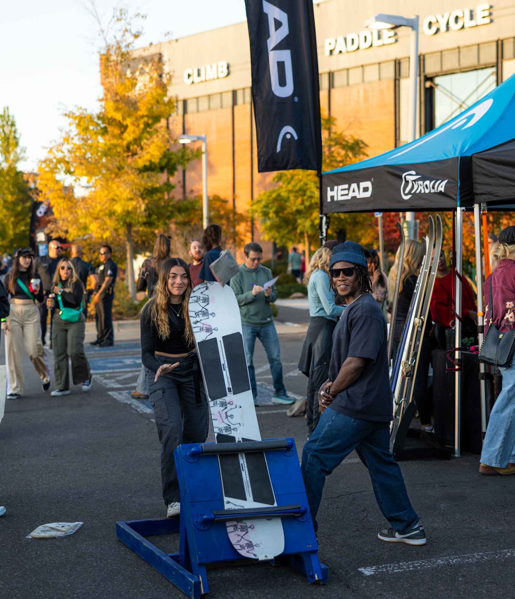 outdoor brand event activation with crowd and booths filmed for commercial video production campaign